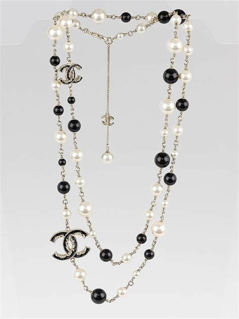 chanel black ball necklace|Chanel long necklace with logo.